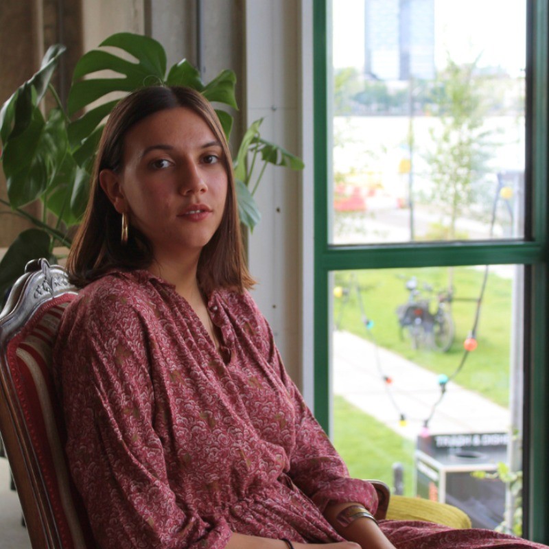 Professional headshot of Bianca Raic working on content strategy